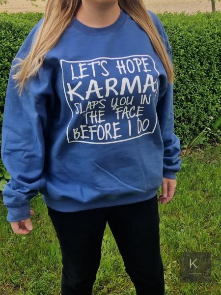 karma slaps sweater